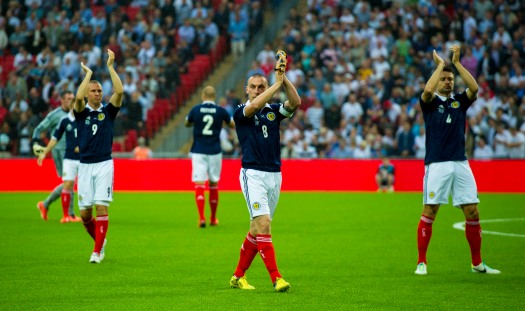 Scotland players applaud the crowd after a 3-2 defeat against England at Wembley