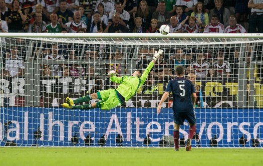 David Marshall at full stretch, as Muller opens the scoring